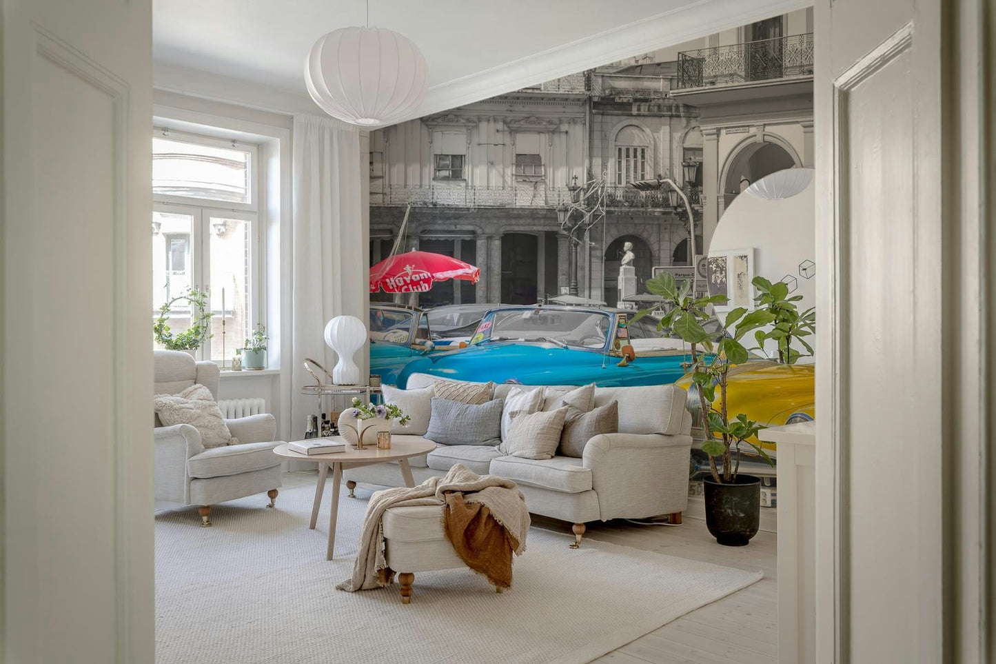 Retro automobile pattern wallpaper in pastel shades for a modern bedroom.