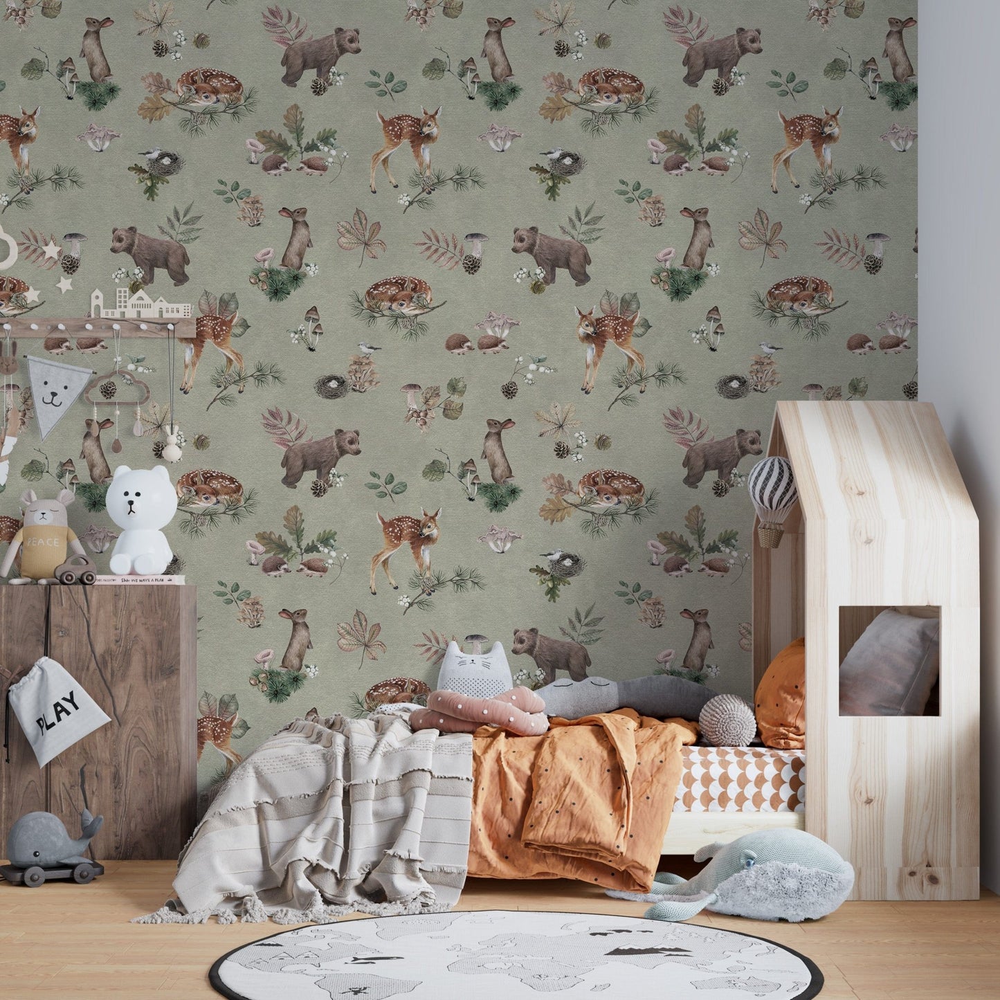 Woodland baby animals wallpaper in green
