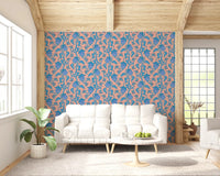 Living room styled with Ophelia Boho Blossoms wallpaper in blue on blush, GD9291