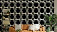 A full-wall mural of a modern, geometric pattern.
