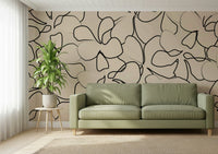 Dense flowing petal and leaf outlines in black on a beige wall mural., GD5479
