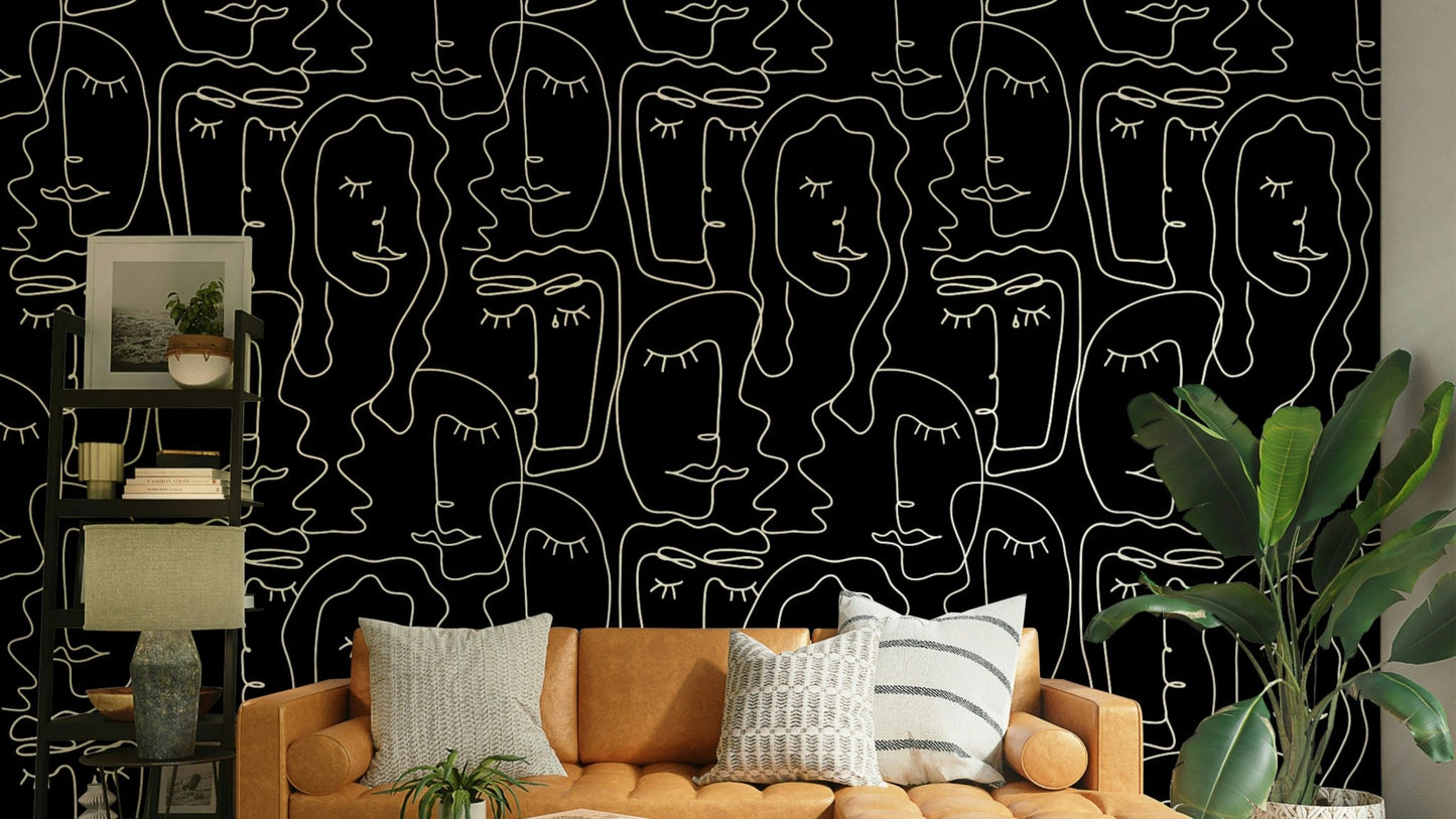 Outline faces wallpaper on a living room wall

