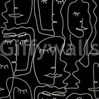 A seamless pattern of faces on a wall

