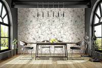 An angled shot of a wall with lily wallpaper

