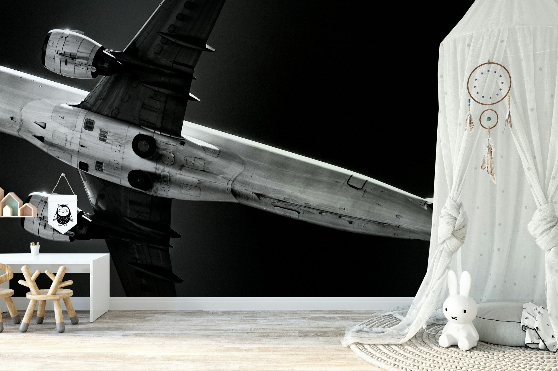 A low-angle view of a jet soars across this wall mural GD4942
