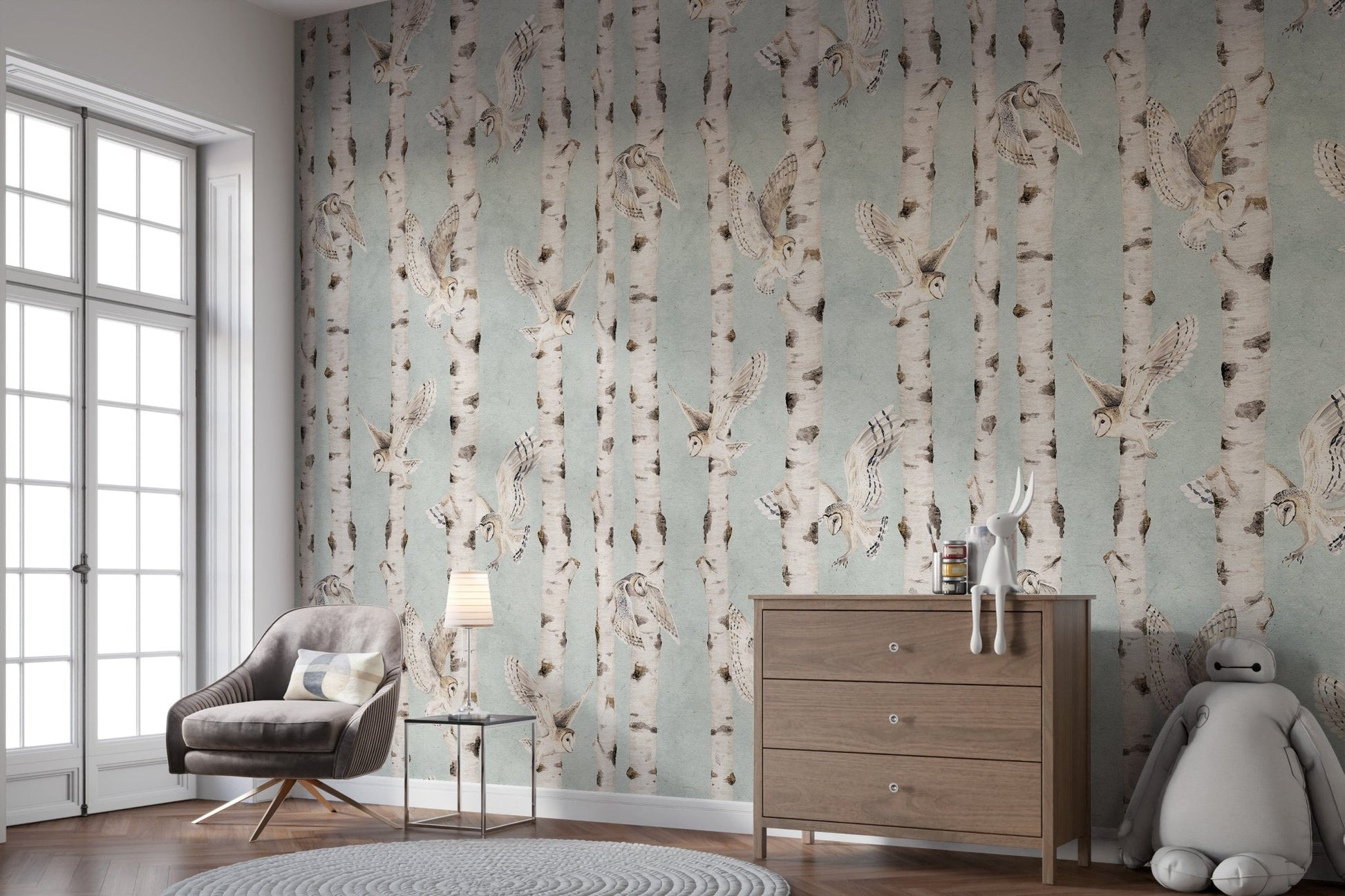 Birch tree wallpaper with flying owls
