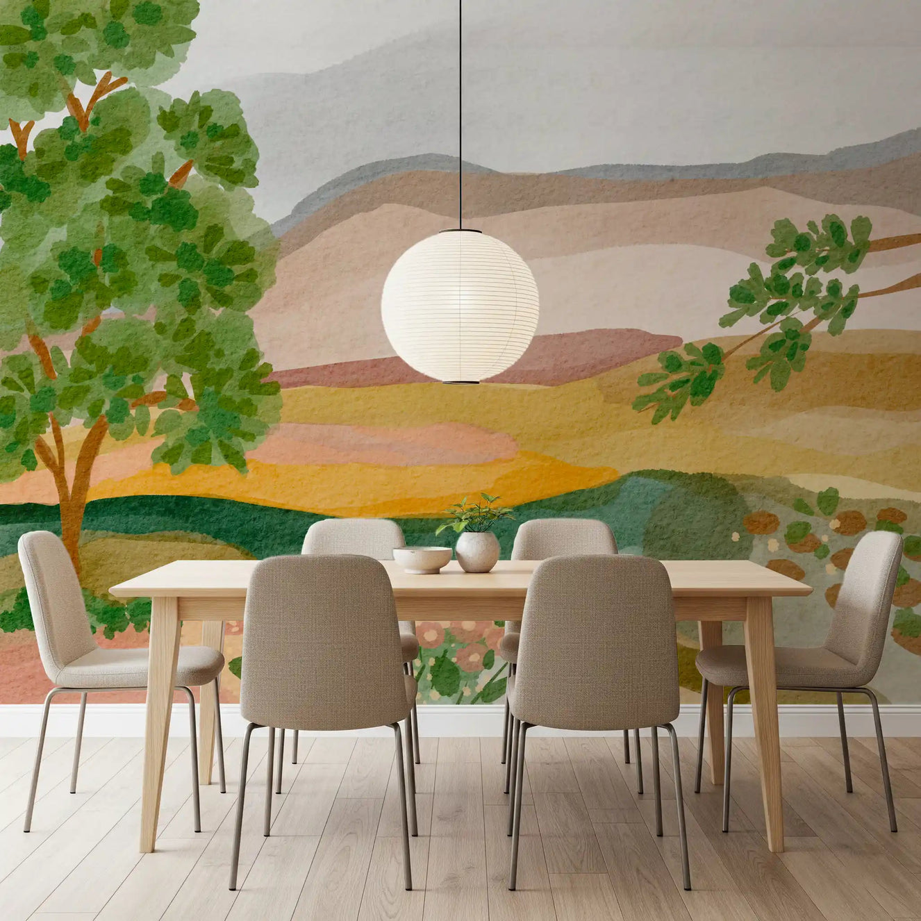 A dining room features the tranquil Painted Hillside Calm Wall Mural as a backdrop.