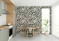 A minimalist home office with the painted lines wallpaper.

