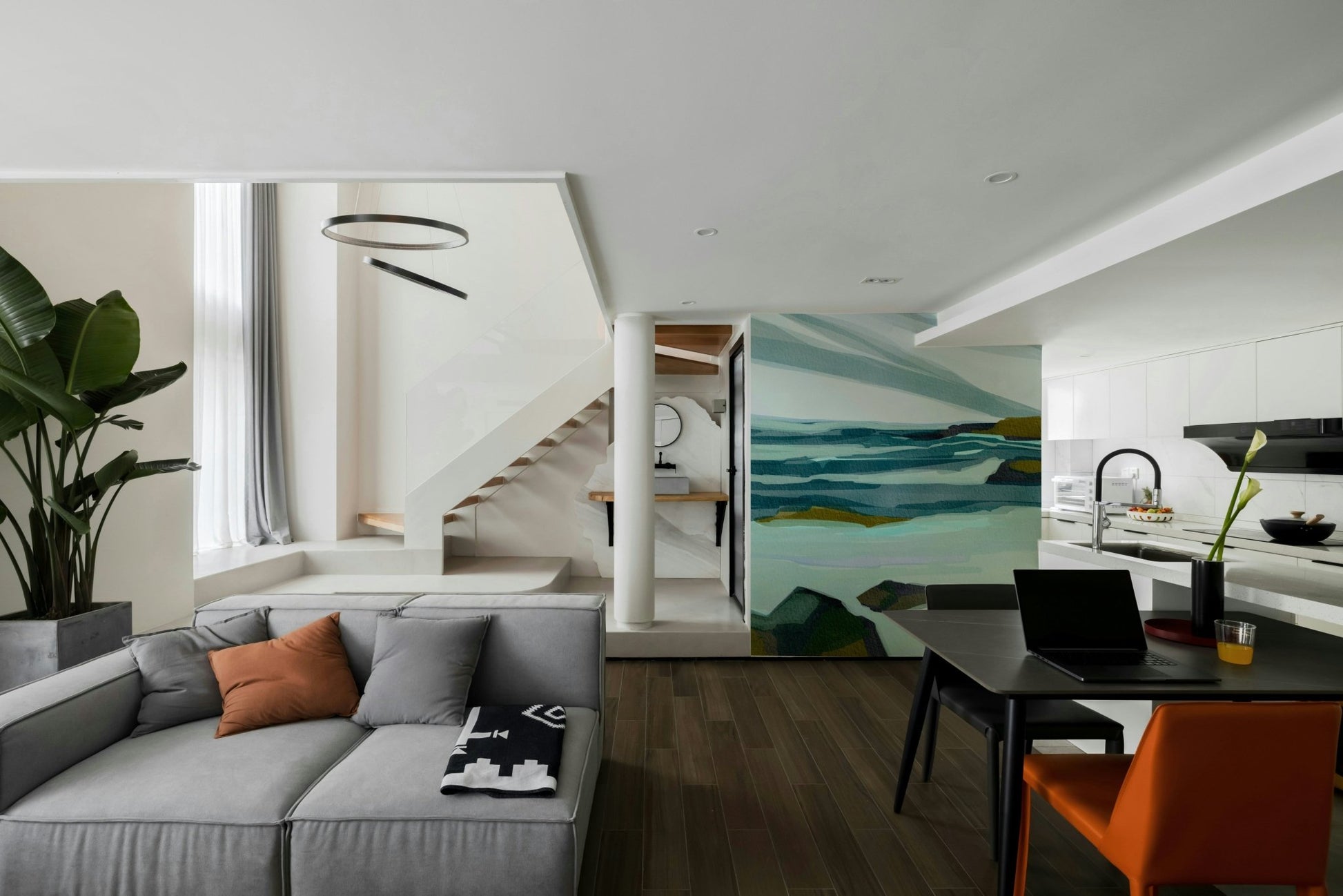 A peaceful wall mural with an artistic coastal scene.

