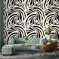 A playroom decorated with wavy lines wallpaper

