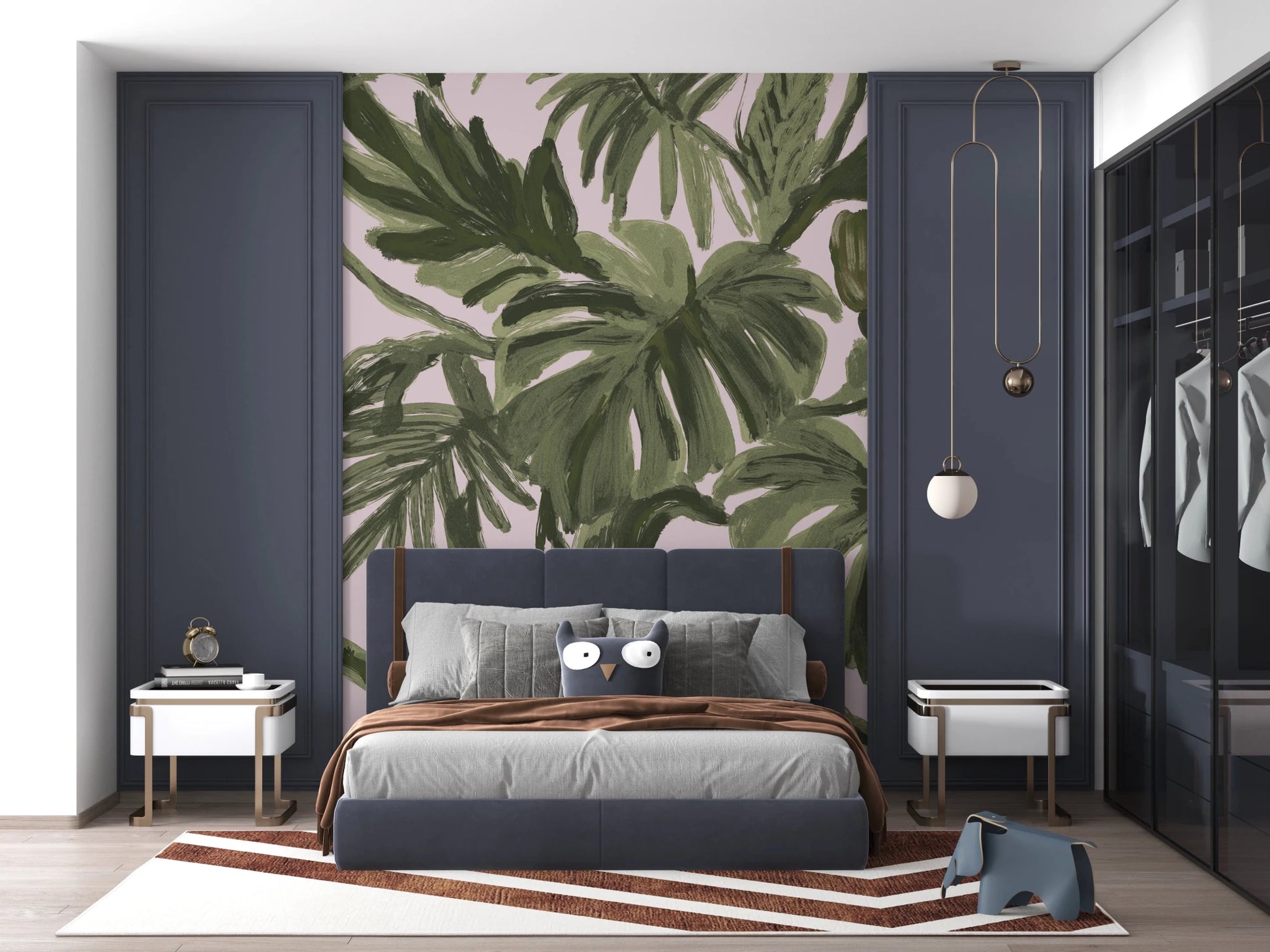 Soft blush wall mural covered in painted tropical palm and leaf shapes
