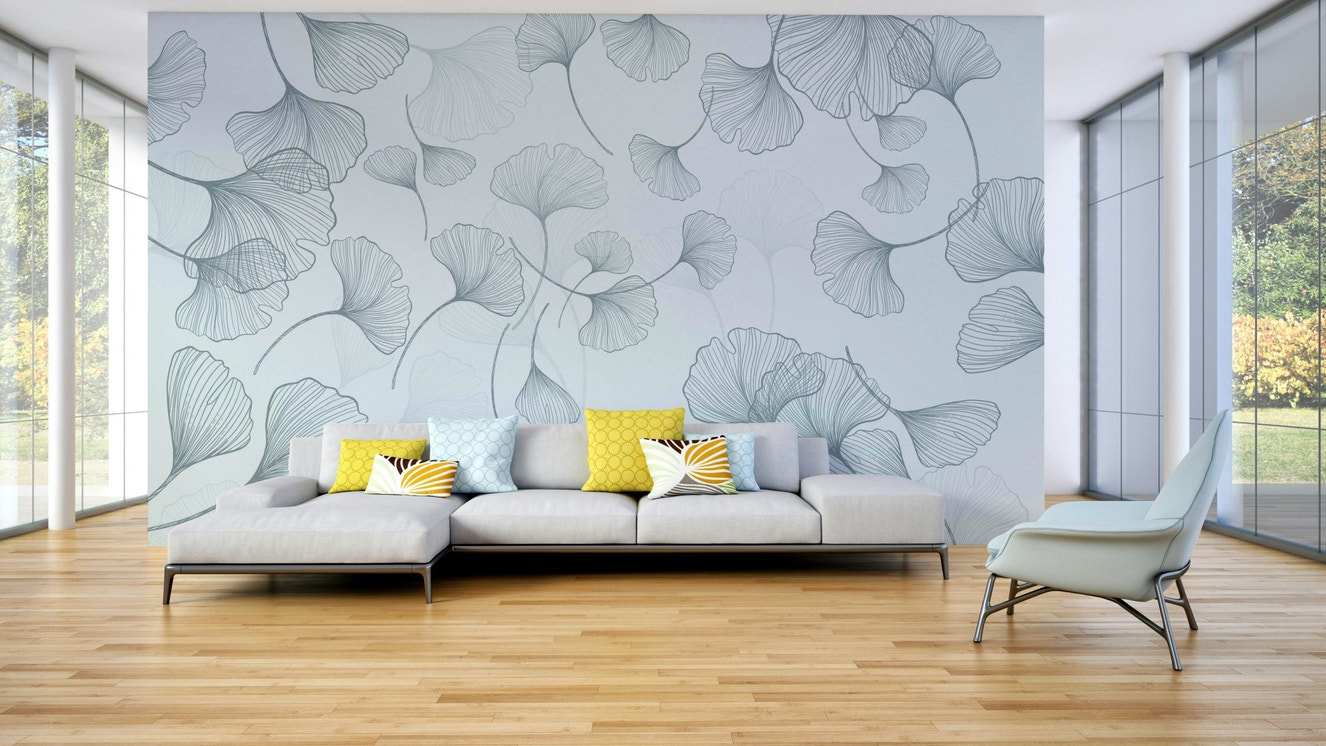 A minimalist wall mural featuring a pattern of ginkgo leaves.

