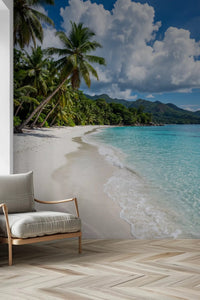 White sand and blue sky define the Palm-Fringed Serenity wall mural
