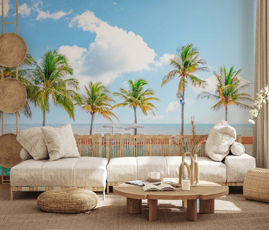 Coastal living room with beige sofa and Palm Pool Escape Wall Mural facing pool view