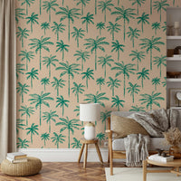 A living room wall covered in a lush, tropical palm tree wallpaper.

