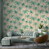 A corner of a room with the palm tree wallpaper design.

