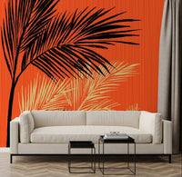Palms at Sunset wall mural behind a sofa in a warm modern lounge setting