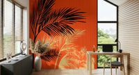 Compact reading corner styled with Palms at Sunset wall mural in warm palm shades