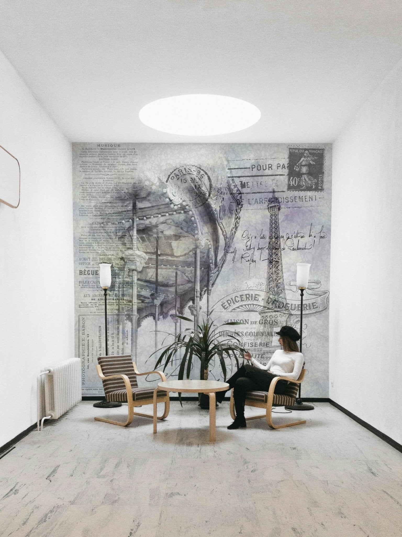 Paris mural combining iconic landmark with festive carousel.

