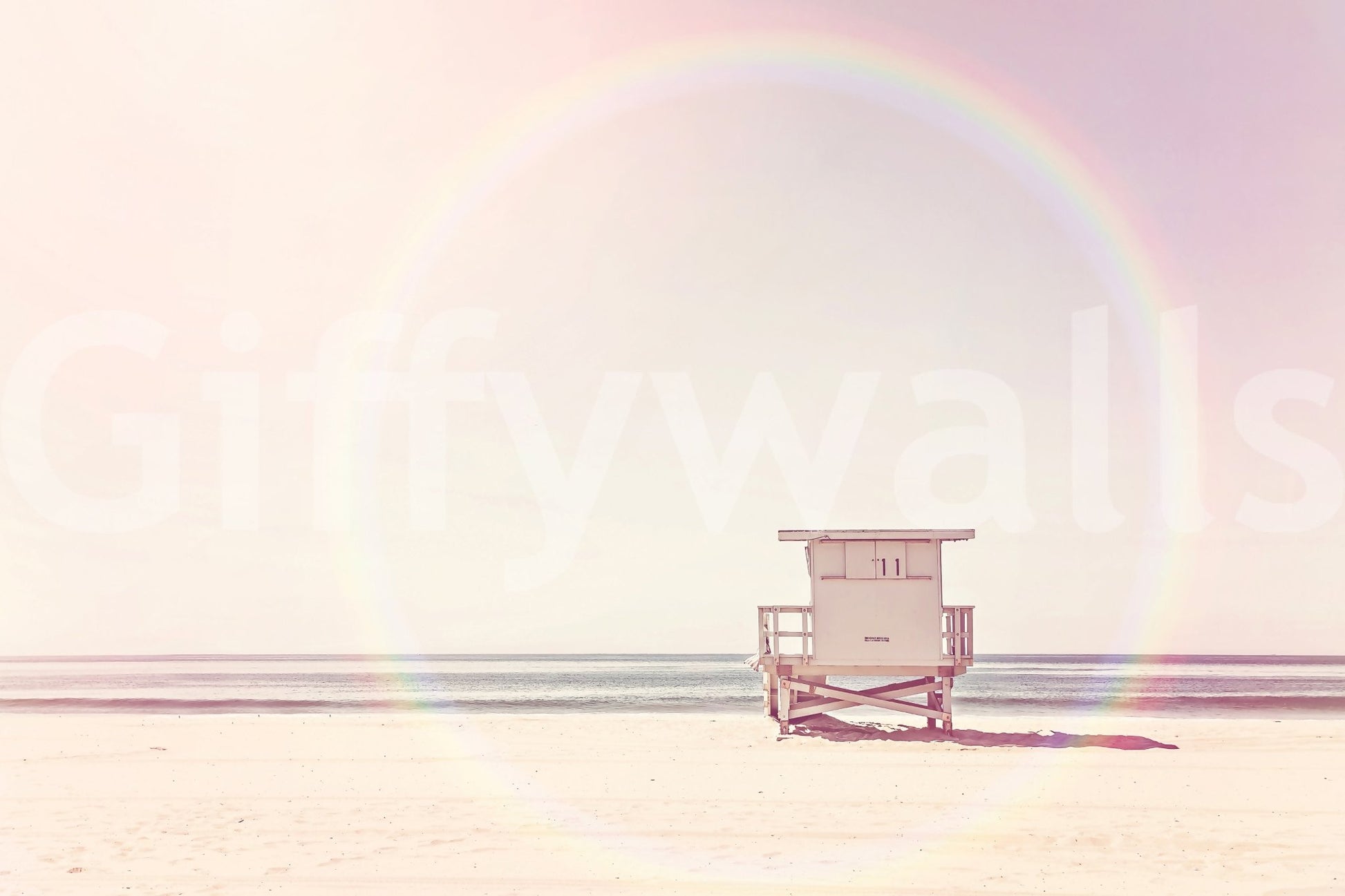 Serene beach mural in pastel colors for a calming vibe.

