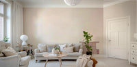 Soft pastel beach wall mural with gentle waves.

