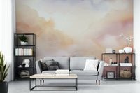 Soft pastel tones in a cloud-themed wall mural.

