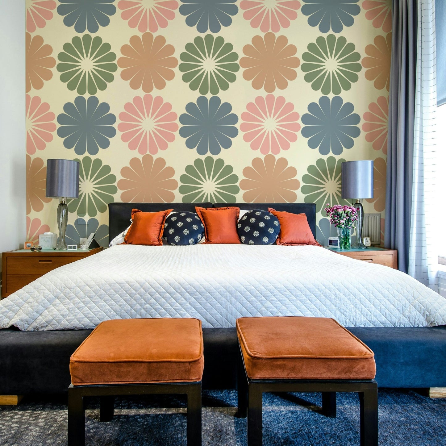The geometric floral pattern flowing across a room's wall.


