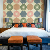 The geometric floral pattern flowing across a room's wall.

