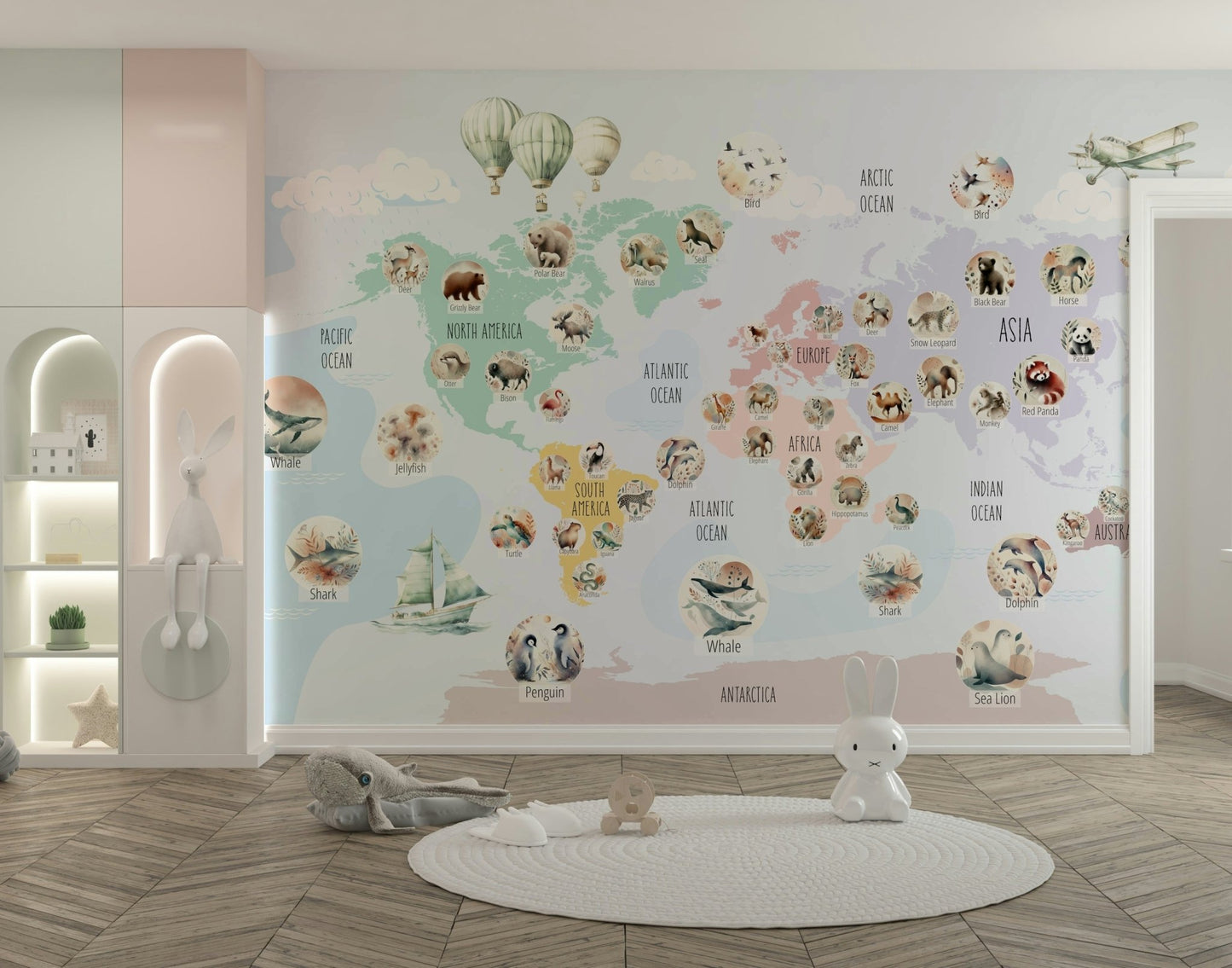 A living room featuring the animal map wall mural.

