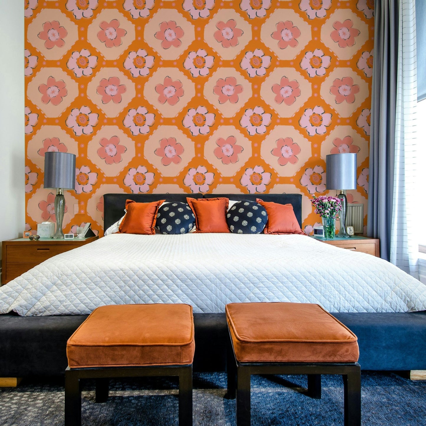 The image shows a repeating pattern of flowers and leaves.

