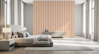 Bedroom with Peach & Cream Stripes Wallpaper and soft neutral seating