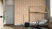 Peach-toned wall mural with abstract blooms

