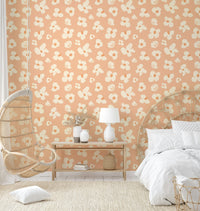 Soft peach abstract blooms on wallpaper roll

