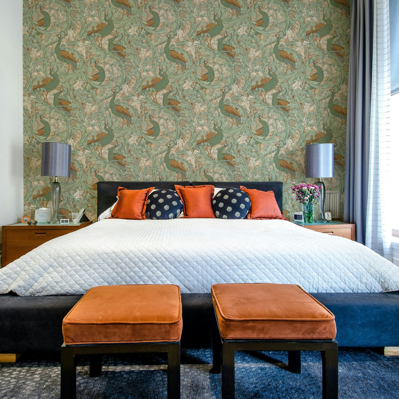 Peacock Garden in green, beige, and mustard wallpaper.

