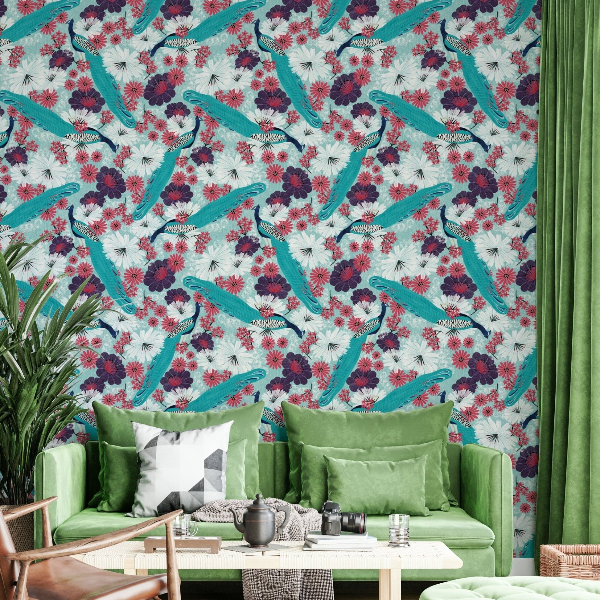 Dining area featuring peacock wall design