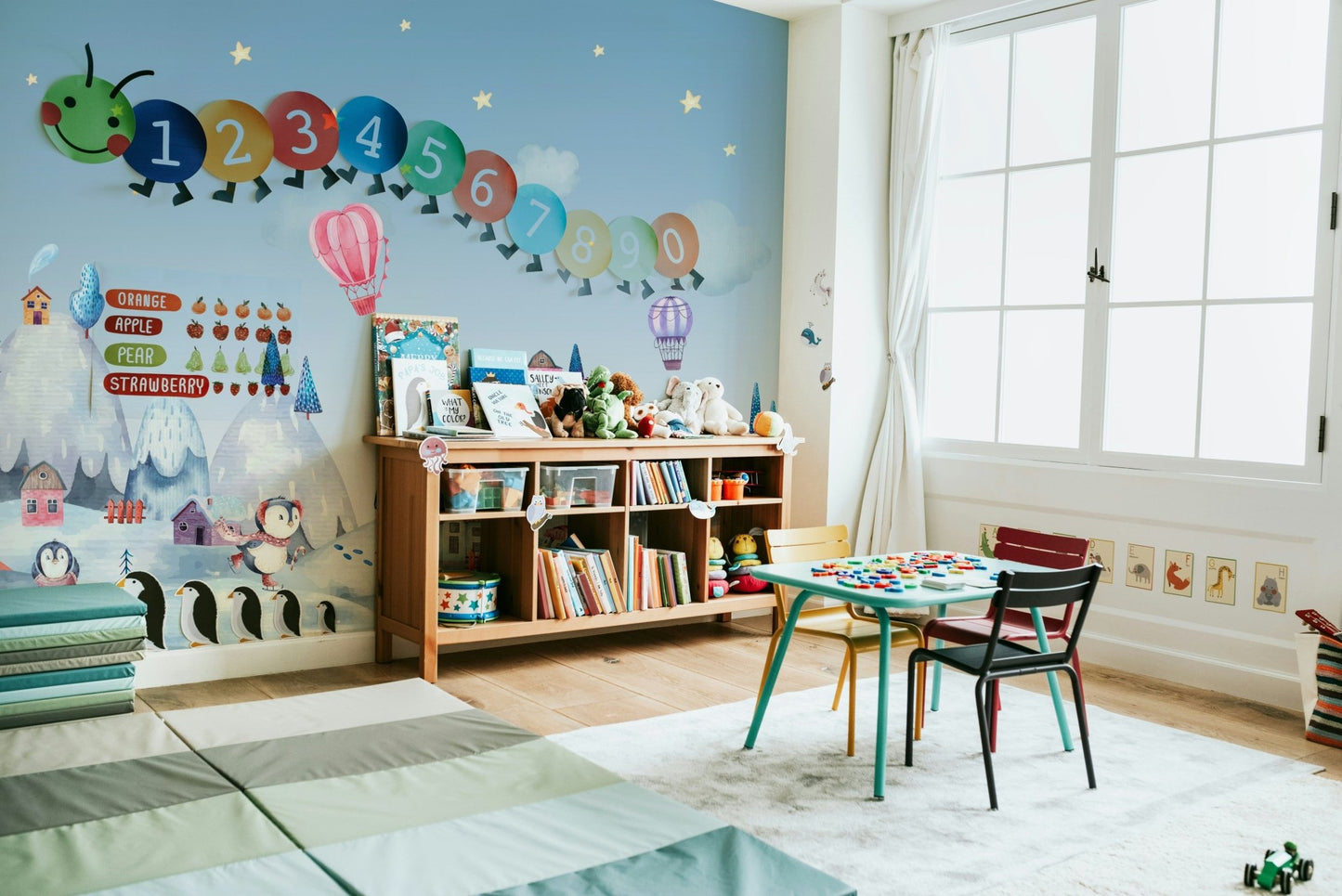 The image features various penguins in a stylized, snowy environment.
