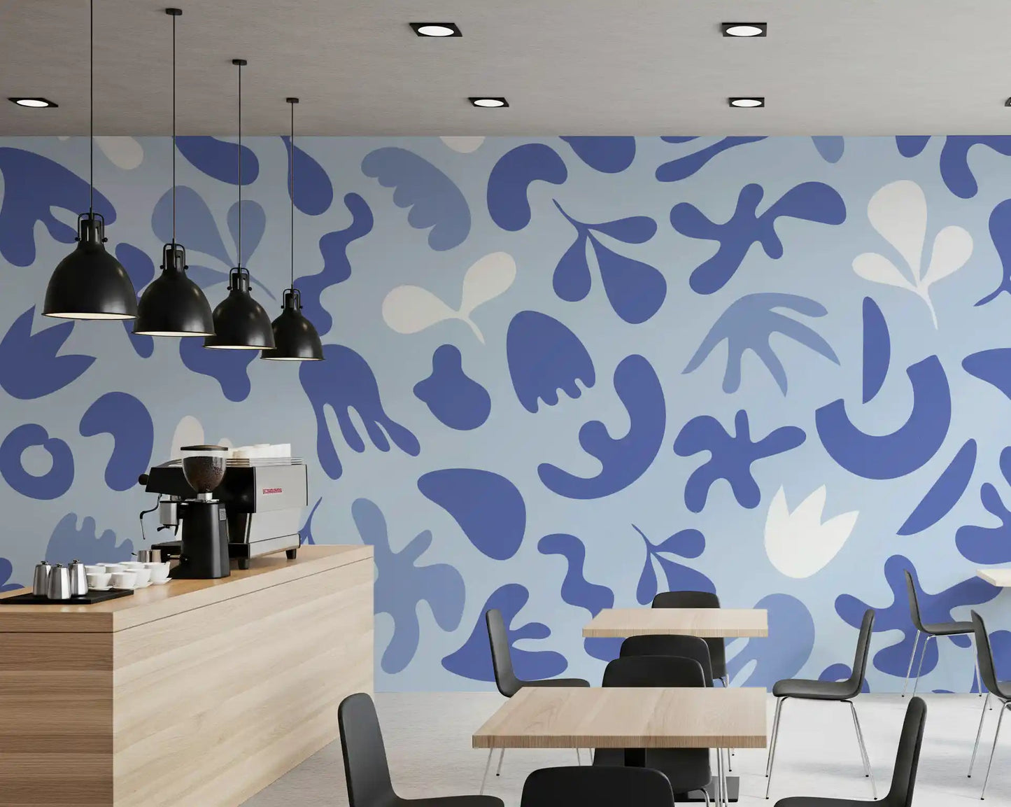 Cafe area styled in Cut Flow wall mural with airy abstract forms
