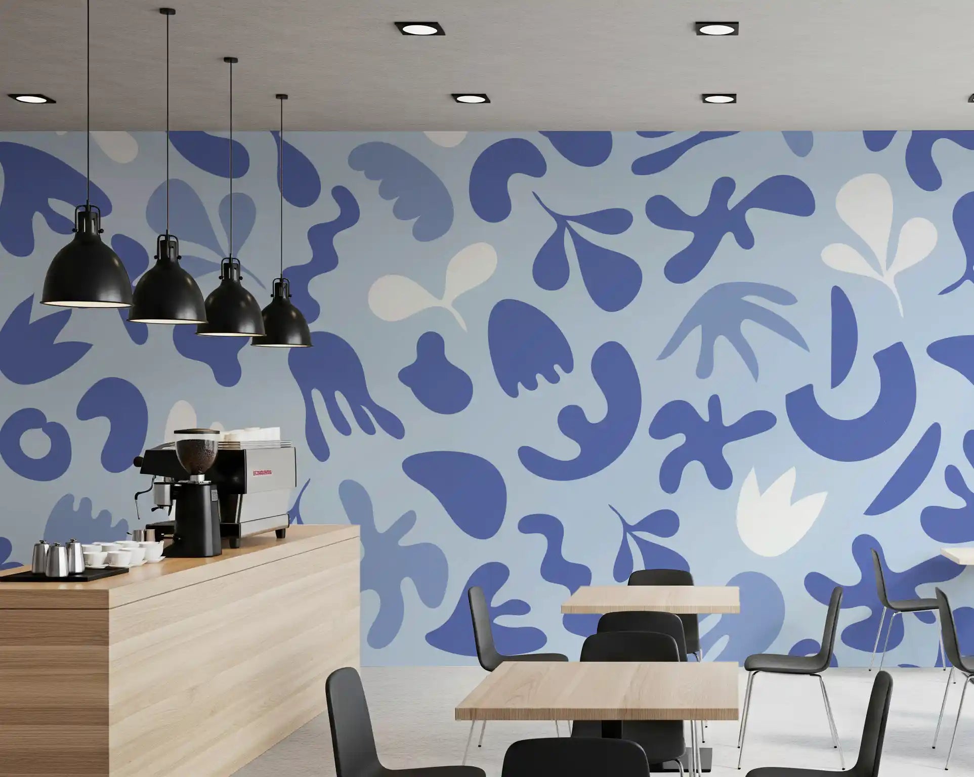 Cafe area styled in Cut Flow wall mural with airy abstract forms