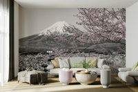 Iconic Japanese mural with color-popped cherry blossoms and Fuji peak.

