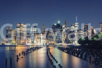 High resolution city lights wall mural with a deep blue nighttime atmosphere.