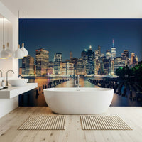 Urban landscape wallpaper showing a panoramic view of a lit-up metropolis.