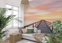 Sunlit corner with Pier to Dreams Wall Mural in a soft lounge with greenery