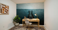 Large scale ocean wallpaper for an open plan apartment living area.