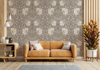 Soft green and beige tones in Pimpernel by William Morris wallpaper

