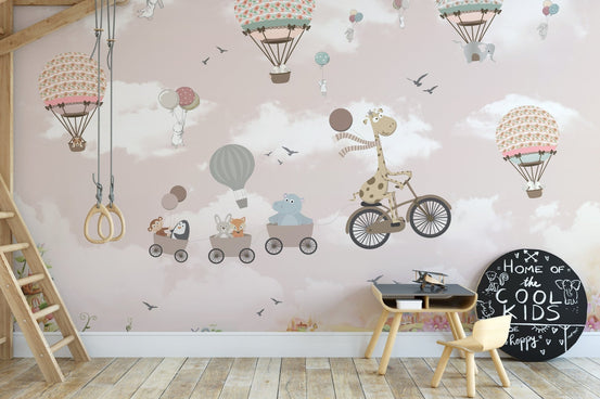 Pink sky wallpaper mural with safari animals in hot air balloons. A612
 