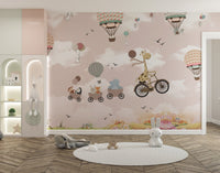 Pink safari balloon animals mural wallpaper for kids' rooms.

