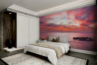 The water is calm and reflects the light.

