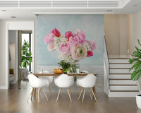 Pink Floral Bloom Wall Mural adds a soft touch to a contemporary dining area.