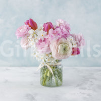 Vibrant pink floral wallpaper for a stylish and inviting entryway.