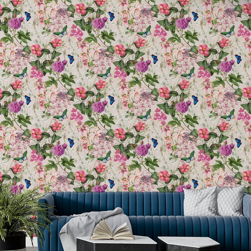 A contemporary living room with a pink floral wall mural.

